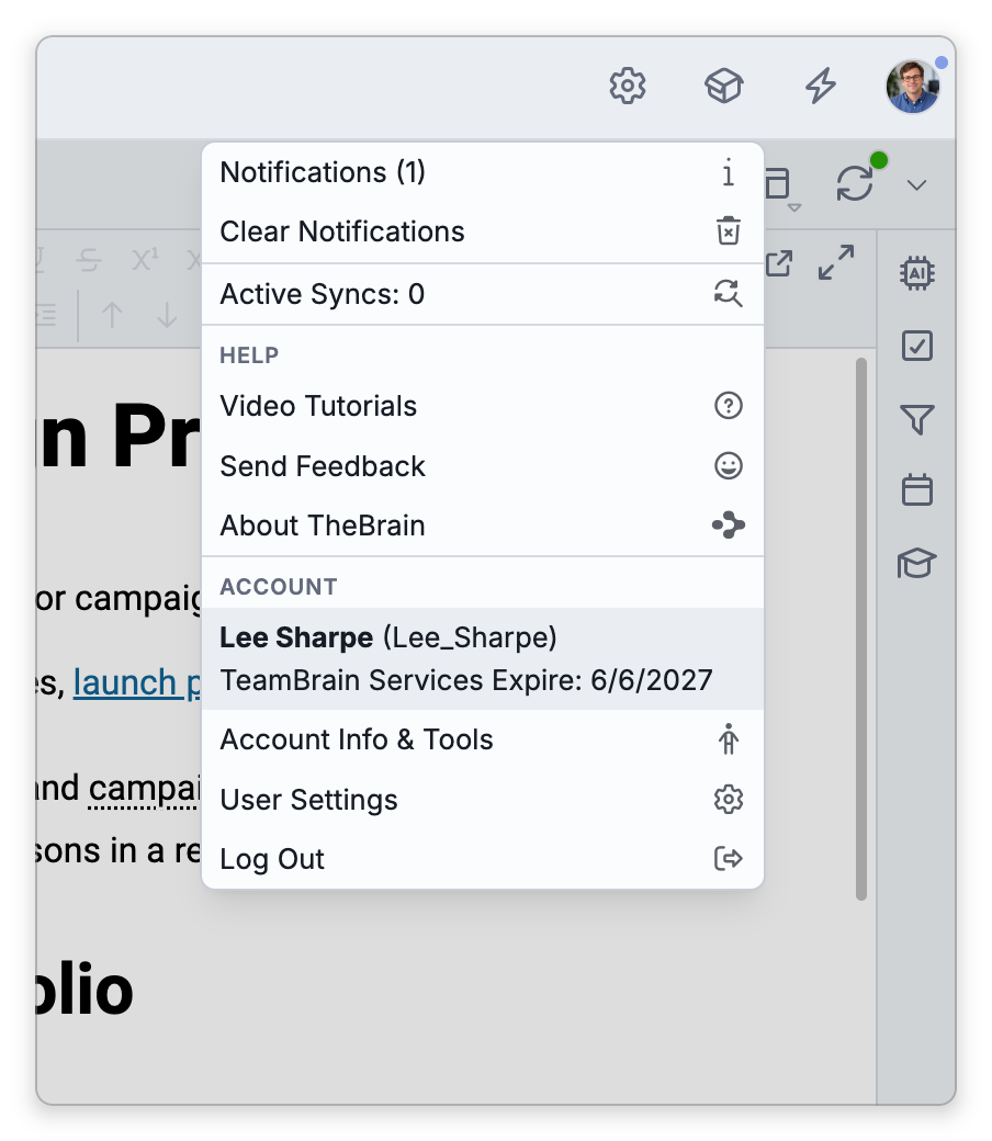 The account menu open under the account button, whose picture has a small dot because a low-priority notification is waiting. The menu starts with Notifications (1) and Clear Notifications, followed by Active Syncs, the Help commands and the account's commands