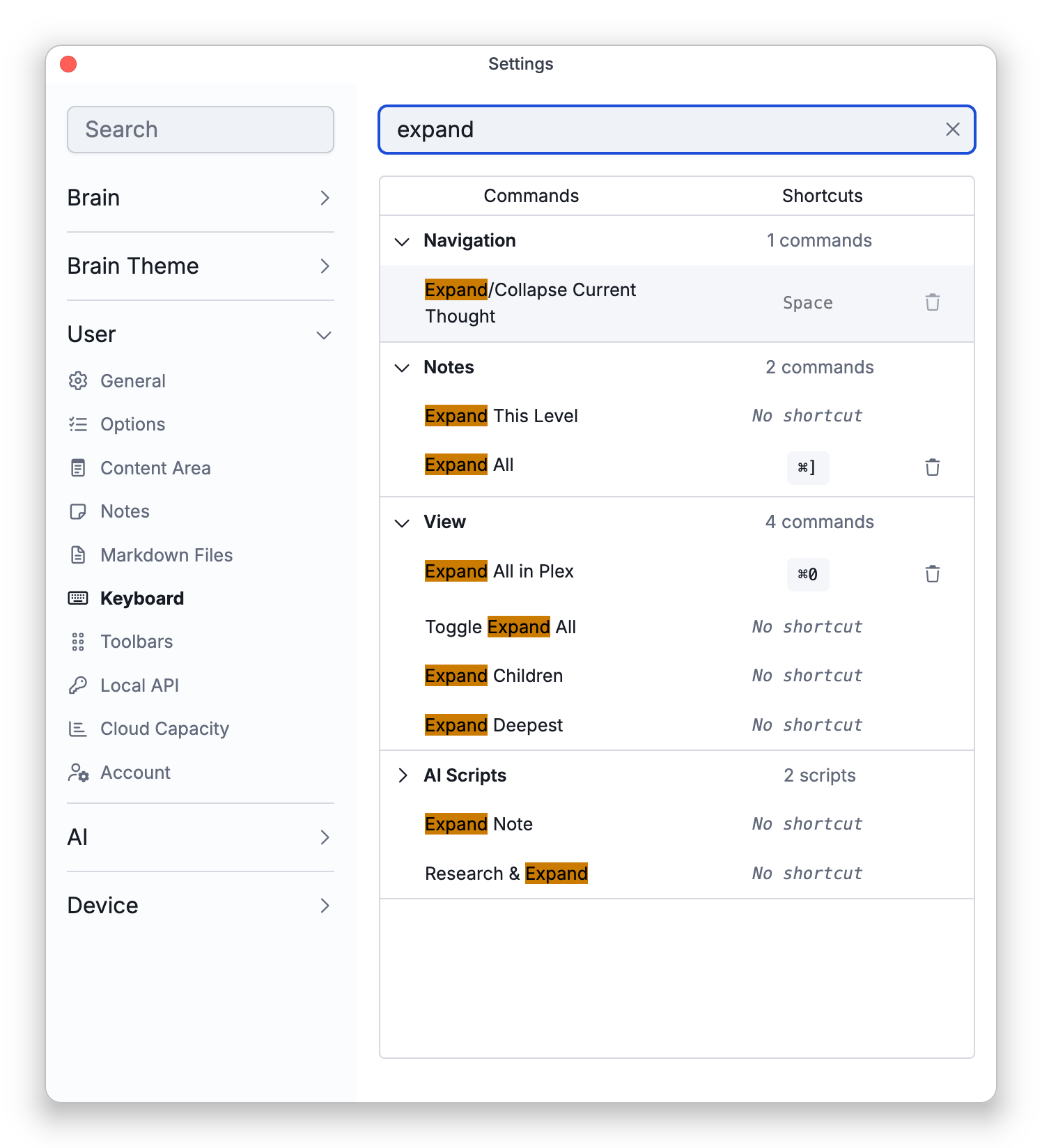 The Keyboard tab in Settings, searched for "expand", showing the matching commands in their groups with their shortcuts