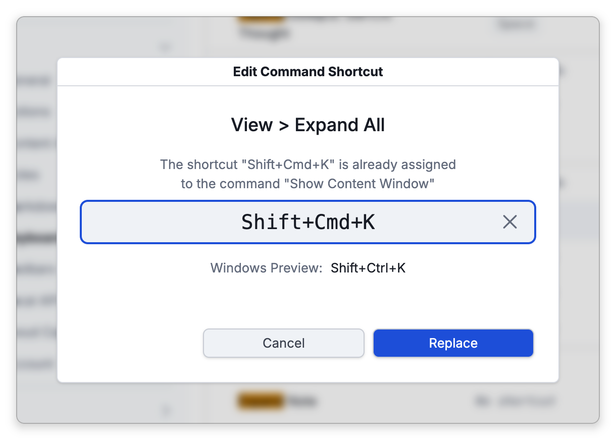 The Edit Command Shortcut dialog for View > Expand All after Shift+Cmd+K was pressed. It says the shortcut is already assigned to the command Show Content Window, shows Windows Preview: Shift+Ctrl+K, and its buttons are Cancel and Replace