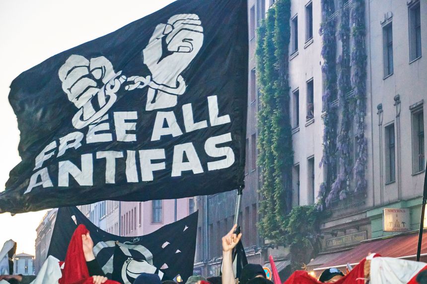 A banner reading ''Free All Antifas'' is displayed at the traditional ''Revolutionarer 1. Mai'' May Day protest in Berlin, Germany, on May 1.